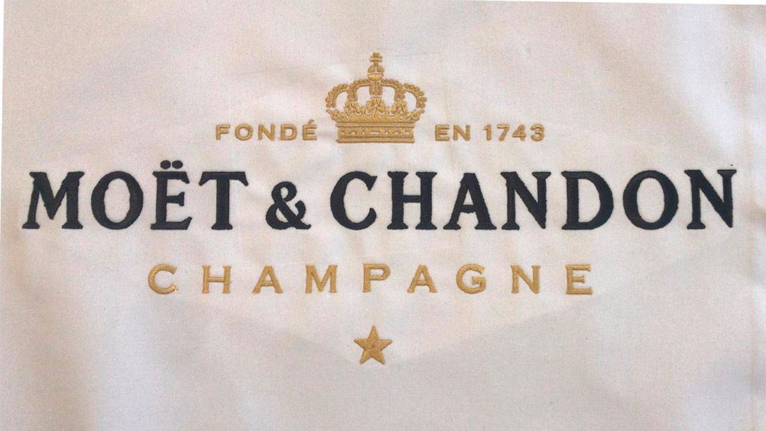 Logo borduren Moet & Chandon